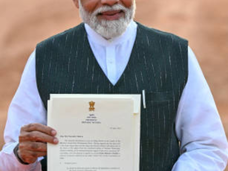 poster of prime minister of india narendra modi holding preamble